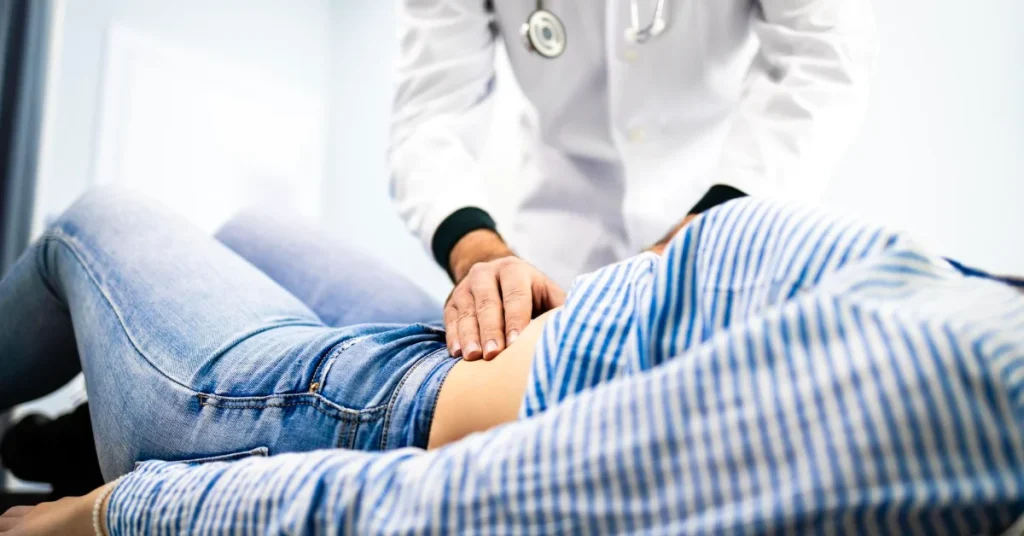 Surgeon performing emergency abdominal injury treatment at EPIC Hospital Ahmedabad
