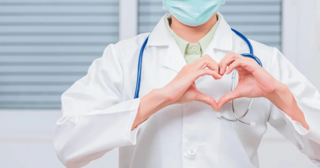 Best cardiologist doctor reviewing cardiac reports with patient at EPIC Hospital Ahmedabad