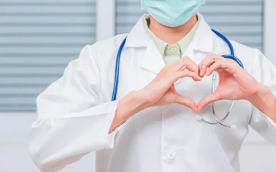 Best cardiologist doctor reviewing cardiac reports with patient at EPIC Hospital Ahmedabad