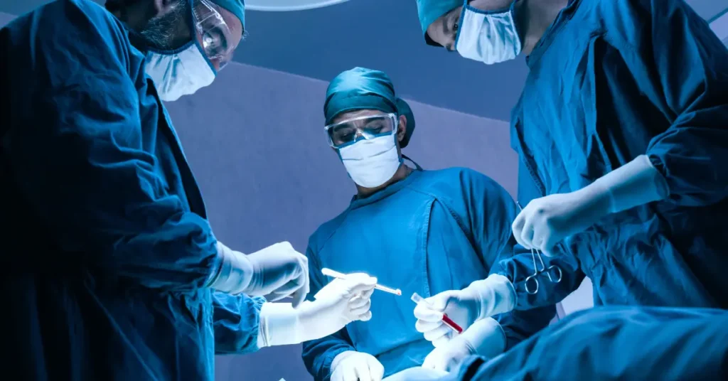 Surgeon performing laparoscopic surgery in an operating room